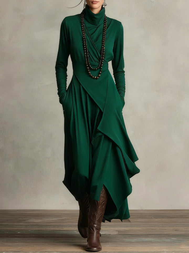 Sandra – Vestito maxi plissettato asimmetrico con collo alto viola