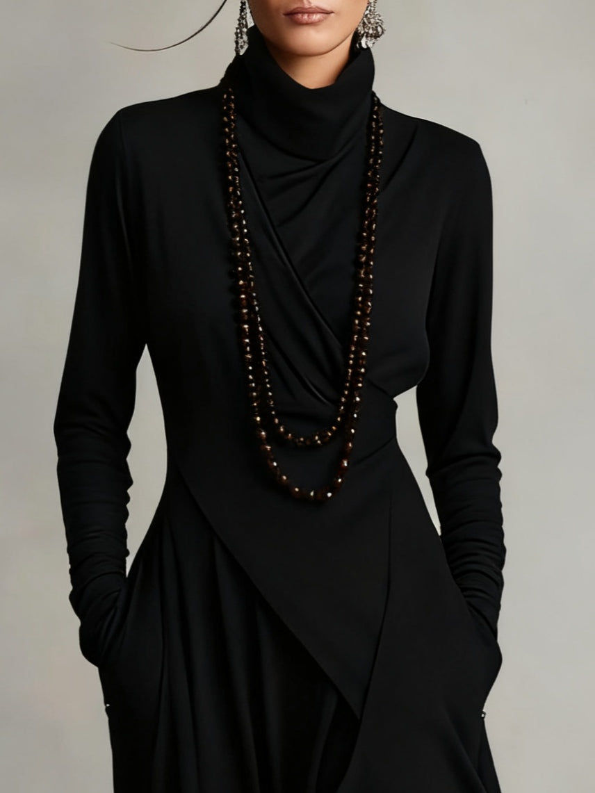 Sandra – Vestito maxi plissettato asimmetrico con collo alto viola
