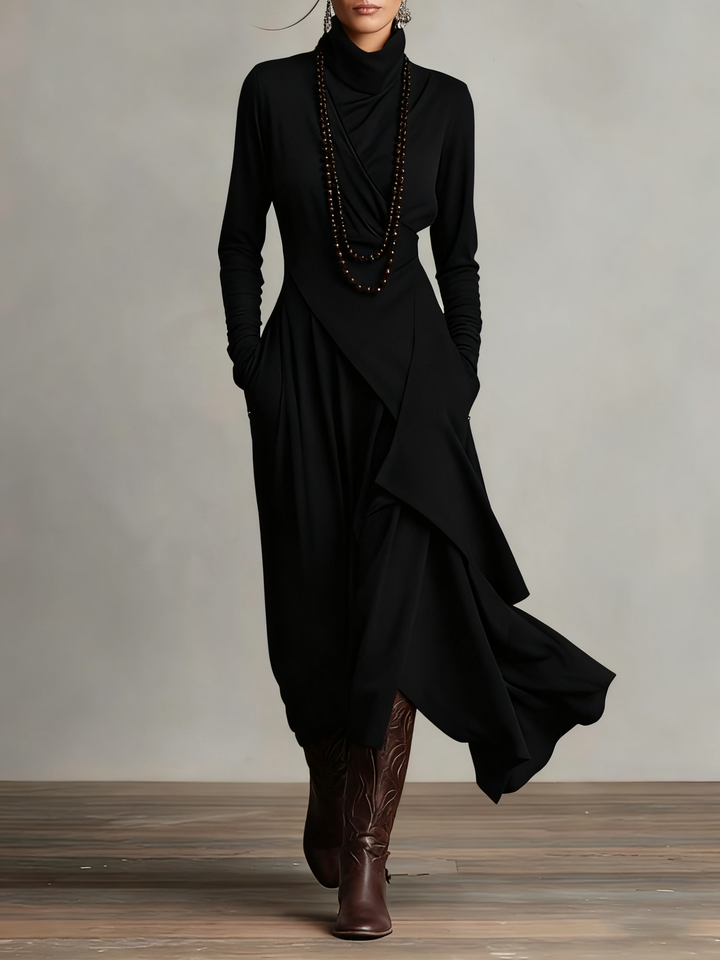 Sandra – Vestito maxi plissettato asimmetrico con collo alto viola